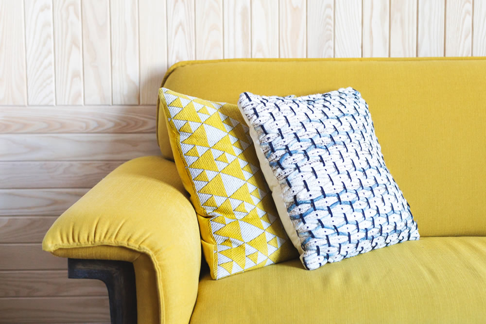 yellow-sofa-with-throw-pillows1000